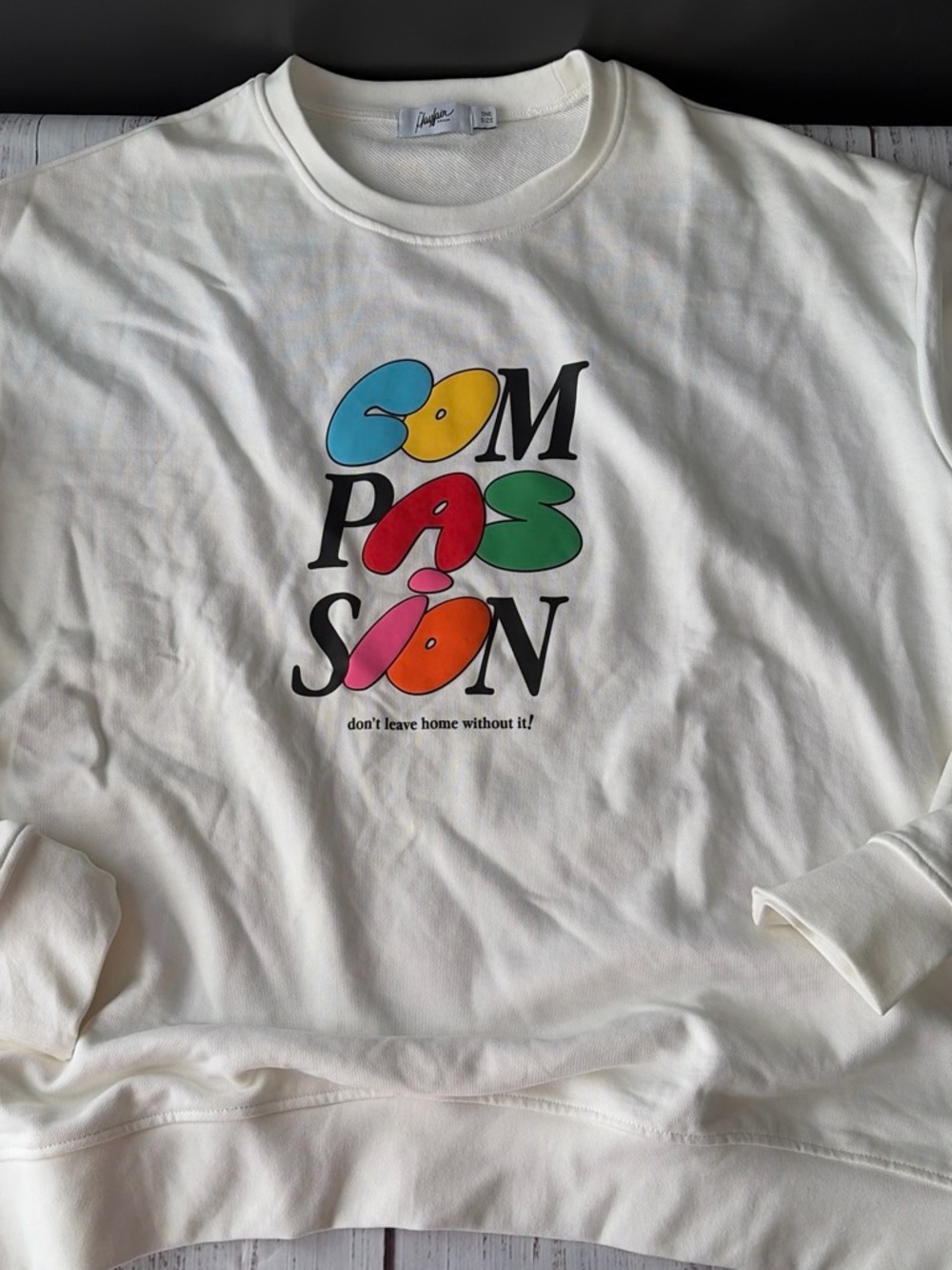 Mayfair White Graphic Men’s Sweatshirt with Colorful 'COMPASSION' Print
